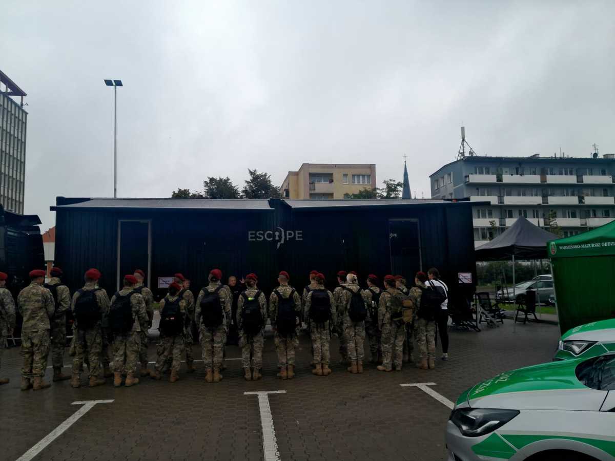 Zdjęcie przedstawia uczestników wydarzenia.