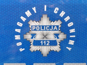 Napis Pomagamy I Chronimy